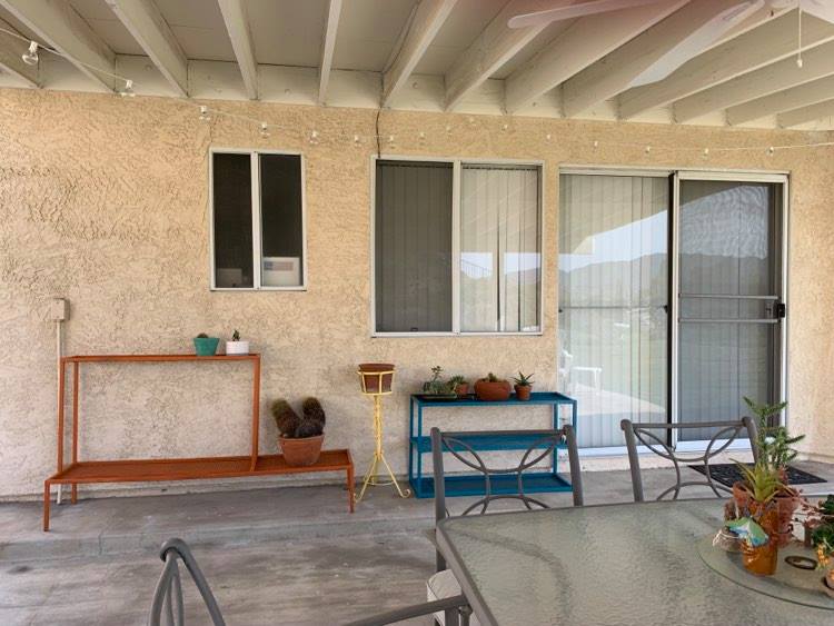 Painted plant racks/shelving.