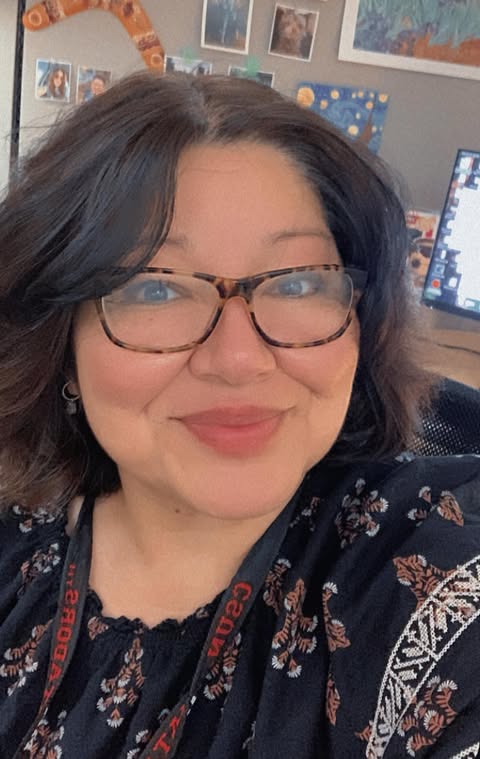 Ti, profile pic in her office. 